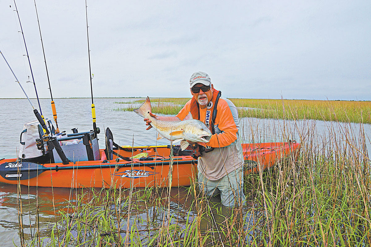 Kayak Fishing in Orange - Sportsman Gear