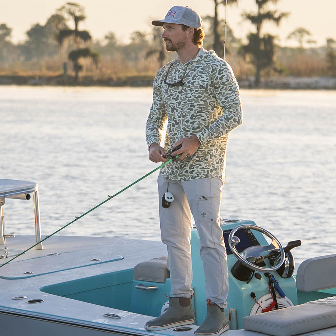 Lightweight bamboo long sleeve hoodie with UPF 50+ sun protection, moisture-wicking fabric, and breathable design for hunting, fishing, hiking, and outdoor adventures.