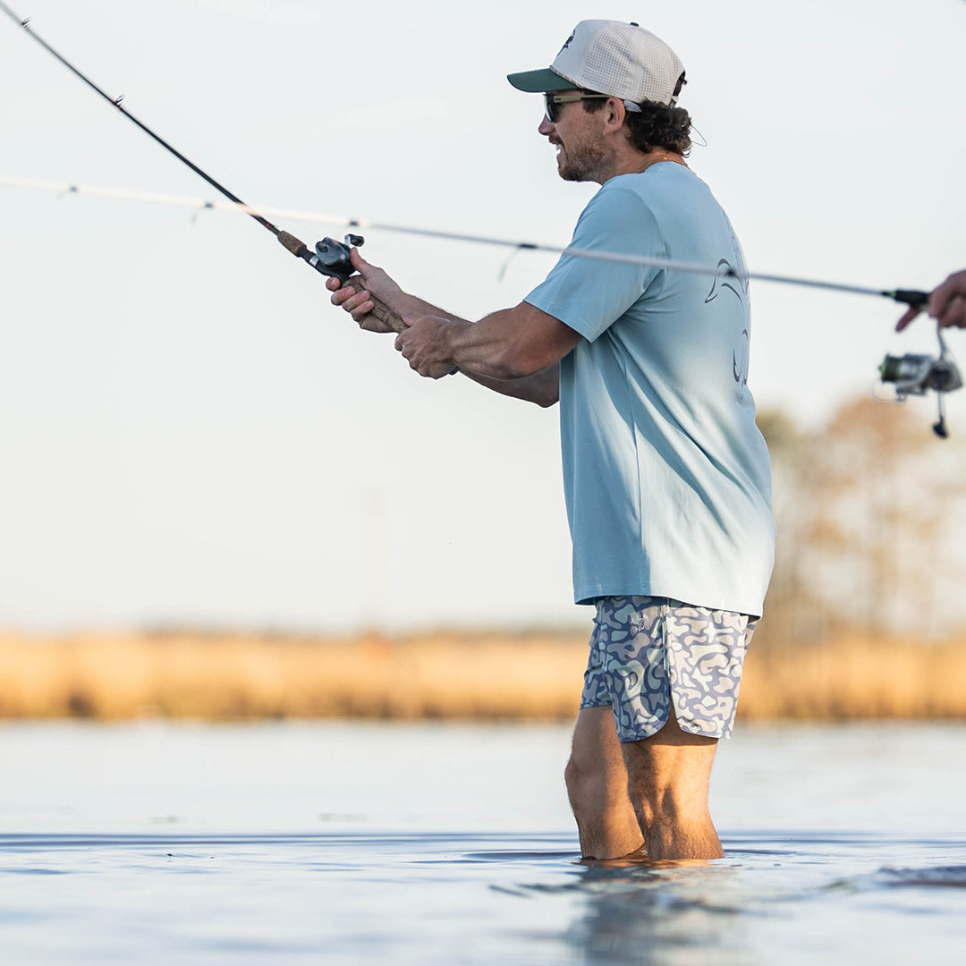 Men’s performance Rock Shorts with 6-inch inseam, made from polyester-spandex blend for stretch, comfort, and durability—ideal for fishing, hiking, and warm-weather outdoor activities.