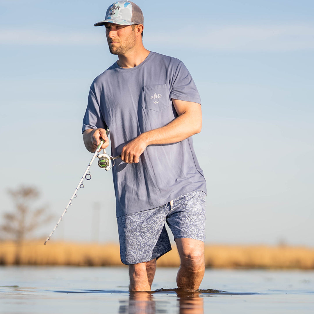 Men’s performance Rock Shorts with 6-inch inseam, made from polyester-spandex blend for stretch, comfort, and durability—ideal for fishing, hiking, and warm-weather outdoor activities.