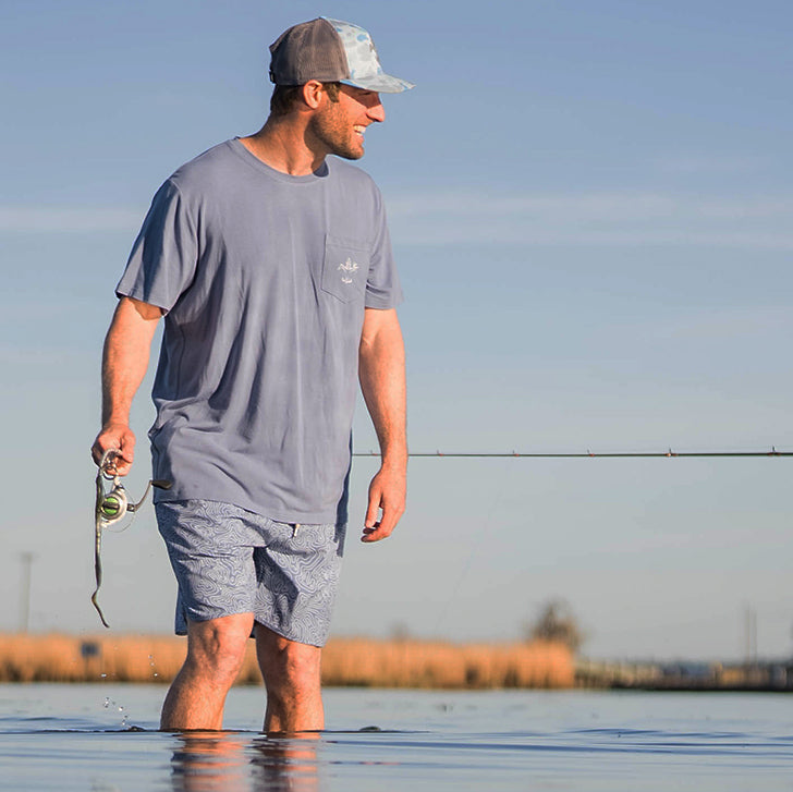 Men’s bamboo cotton stretch pocket T-shirt with Sportsman logo, featuring UPF 50+ sun protection, moisture-wicking breathable fabric, and a flattering fit for hunting, fishing, hiking, and outdoor performance wear.