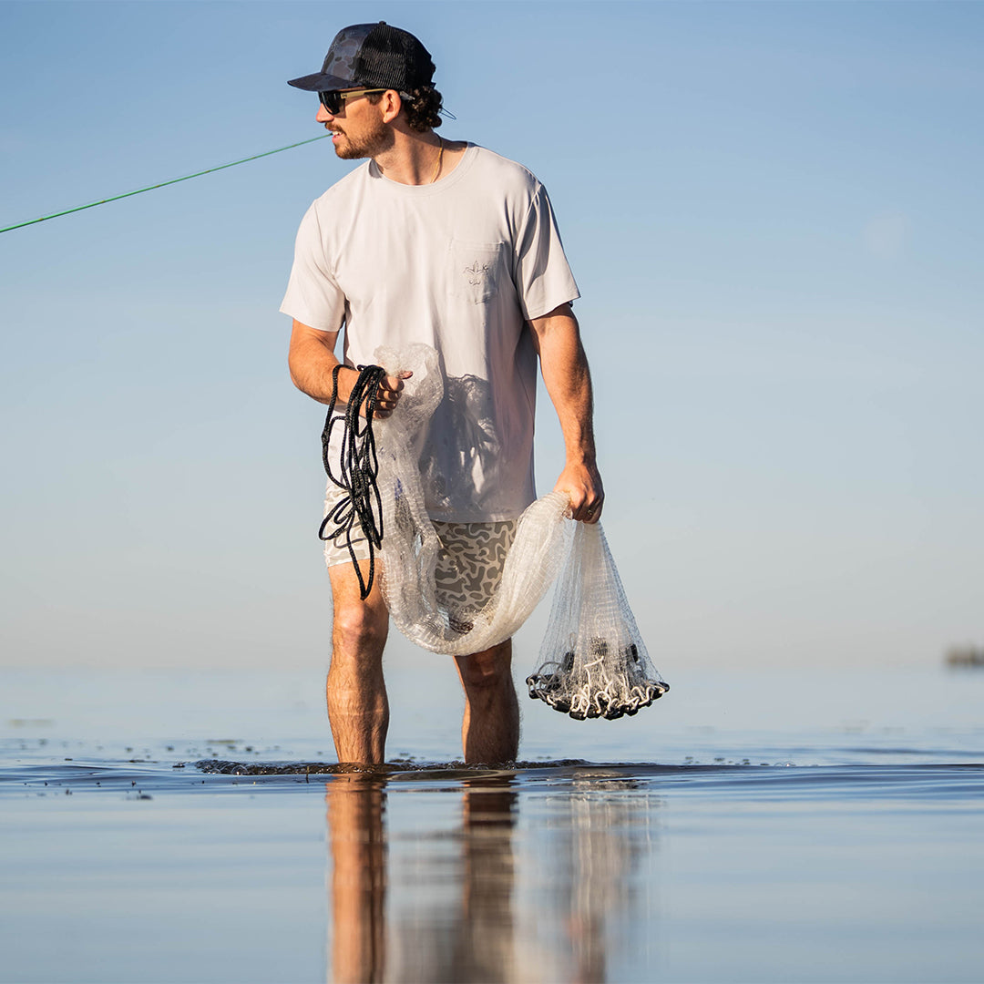 Men’s bamboo cotton stretch pocket T-shirt with Sportsman logo, featuring UPF 50+ sun protection, moisture-wicking breathable fabric, and a flattering fit for hunting, fishing, hiking, and outdoor performance wear.
