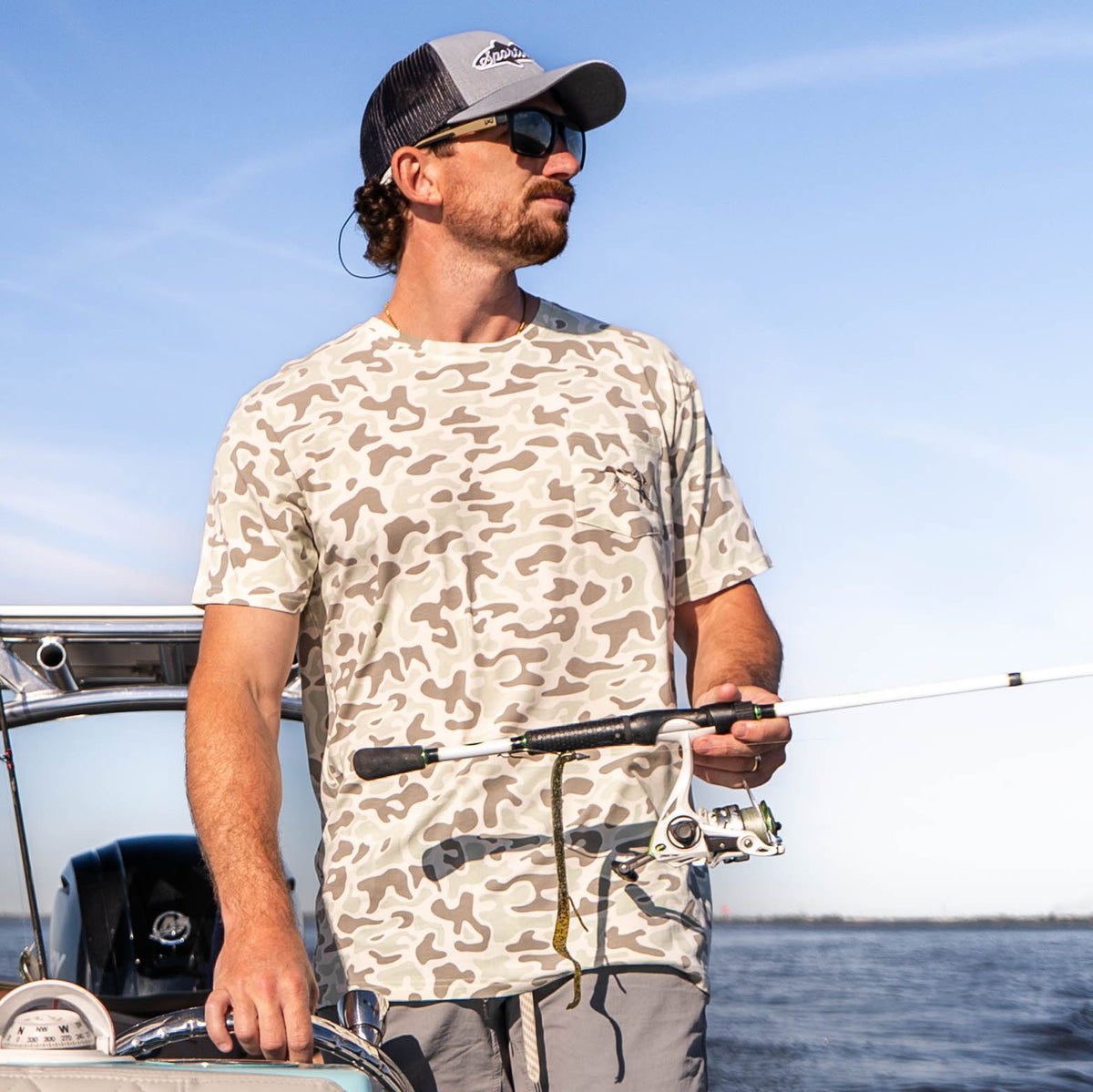 Performance bamboo blend short sleeve T-shirt with camouflage print, wildlife designs on pocket, breathable and stretchy, perfect for hunting, fishing, and outdoor activities.