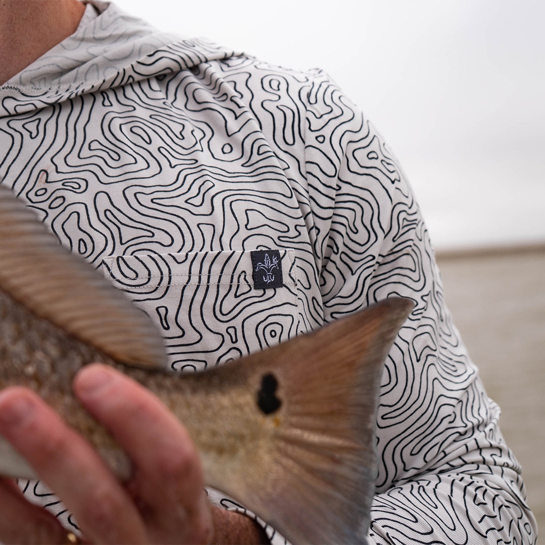 Lightweight bamboo long sleeve hoodie with UPF 50+ sun protection, moisture-wicking fabric, and breathable design for hunting, fishing, hiking, and outdoor adventures.