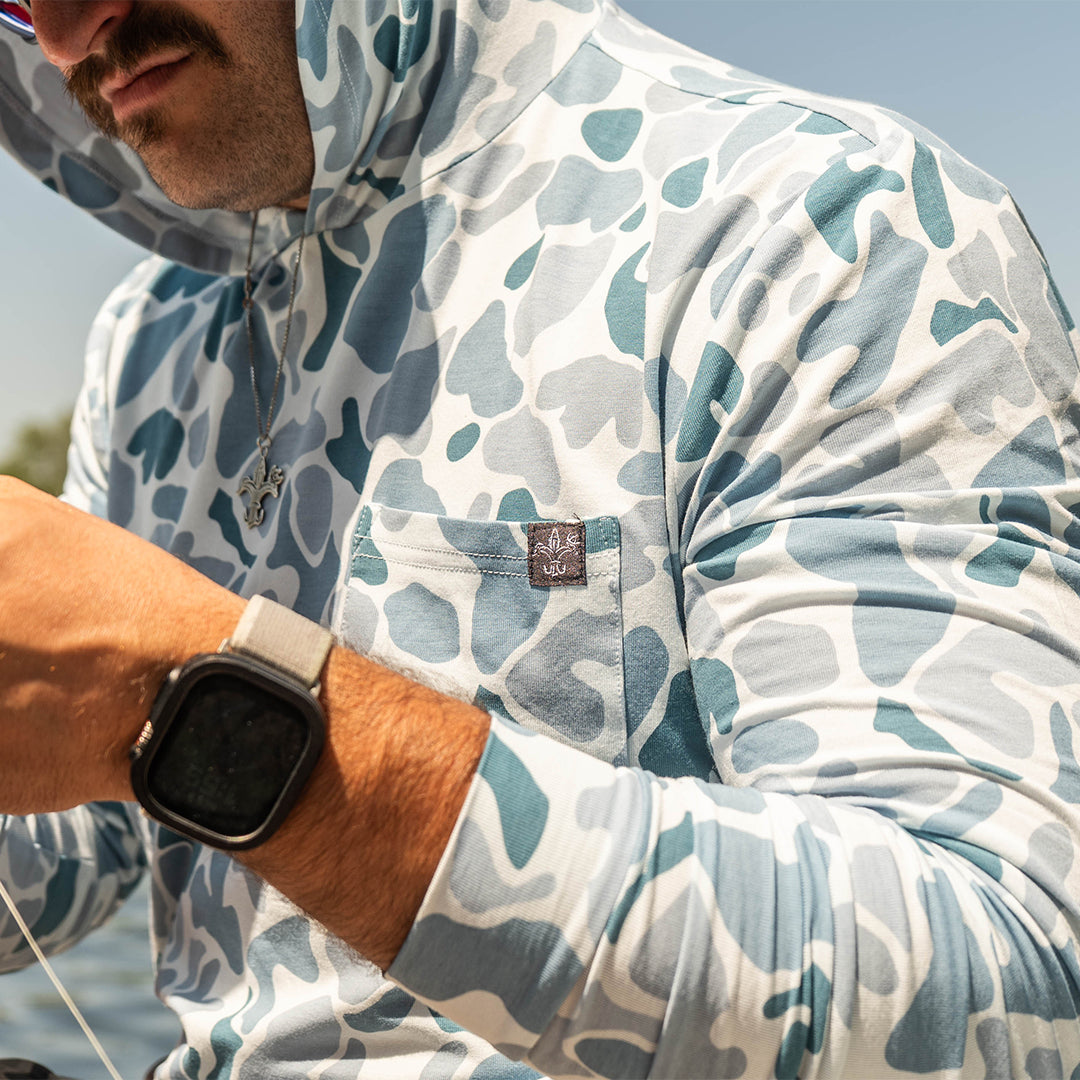 Lightweight bamboo long sleeve hoodie with UPF 50+ sun protection, moisture-wicking fabric, and breathable design for hunting, fishing, hiking, and outdoor adventures.