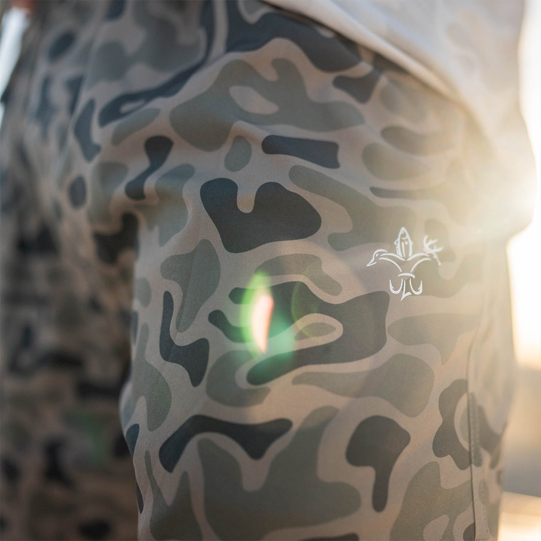 Men’s performance Rock Shorts with 6-inch inseam, made from polyester-spandex blend for stretch, comfort, and durability—ideal for fishing, hiking, and warm-weather outdoor activities.