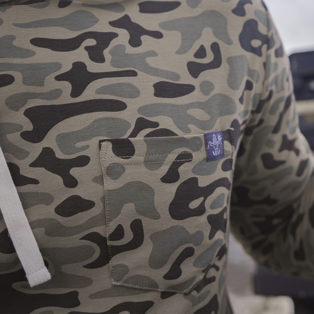 Lightweight bamboo long sleeve hoodie with UPF 50+ sun protection, moisture-wicking fabric, and breathable design for hunting, fishing, hiking, and outdoor adventures.