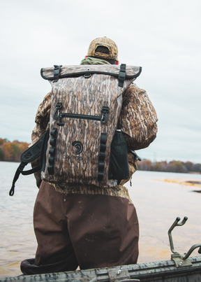 *PRESALE ONLY - Restocking June 2025* Mossy Oak - 25-Liter, Auto-Sealing, Waterproof, Floating, Scent Proof Dry Bag