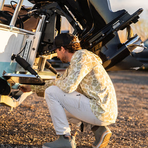 Lightweight bamboo long sleeve hoodie with UPF 50+ sun protection, moisture-wicking fabric, and breathable design for hunting, fishing, hiking, and outdoor adventures.