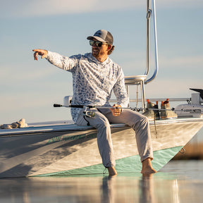Lightweight bamboo long sleeve hoodie with UPF 50+ sun protection, moisture-wicking fabric, and breathable design for hunting, fishing, hiking, and outdoor adventures.