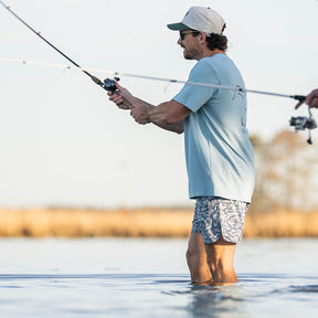 Men’s performance Rock Shorts with 6-inch inseam, made from polyester-spandex blend for stretch, comfort, and durability—ideal for fishing, hiking, and warm-weather outdoor activities.