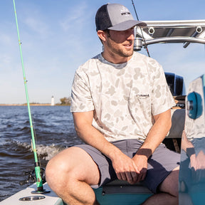 Performance bamboo blend short sleeve T-shirt with camouflage print, wildlife designs on pocket, breathable and stretchy, perfect for hunting, fishing, and outdoor activities.