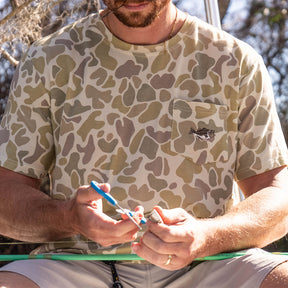 Performance bamboo blend short sleeve T-shirt with camouflage print, wildlife designs on pocket, breathable and stretchy, perfect for hunting, fishing, and outdoor activities.