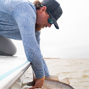 Lightweight bamboo long sleeve hoodie with UPF 50+ sun protection, moisture-wicking fabric, and breathable design for hunting, fishing, hiking, and outdoor adventures.