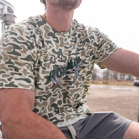 Performance bamboo blend short sleeve T-shirt with camouflage print, wildlife designs on pocket, breathable and stretchy, perfect for hunting, fishing, and outdoor activities.